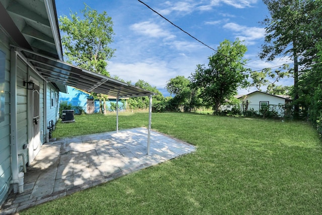 4918 Perry St, Houston, TX 77021 - view of yard featuring central AC and a patio