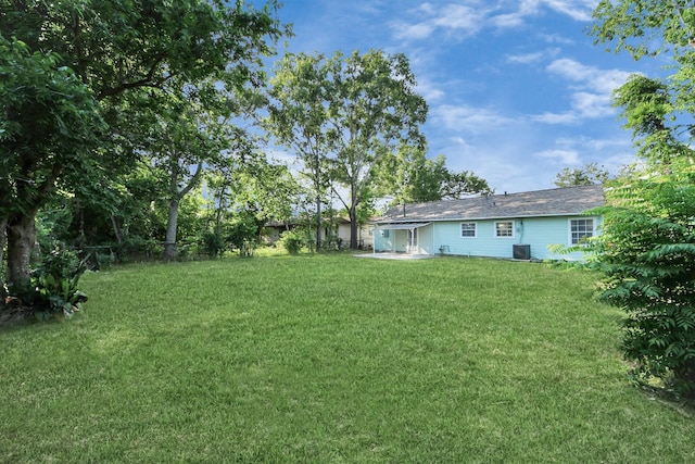 4918 Perry St, Houston, TX 77021 - view of green lawn with central AC unit