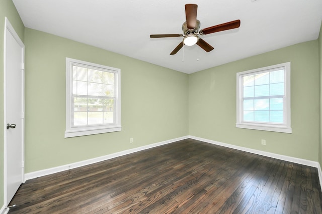 4918 Perry St, Houston, TX 77021 - unfurnished room featuring dark wood finished floors, ceiling fan, and baseboards