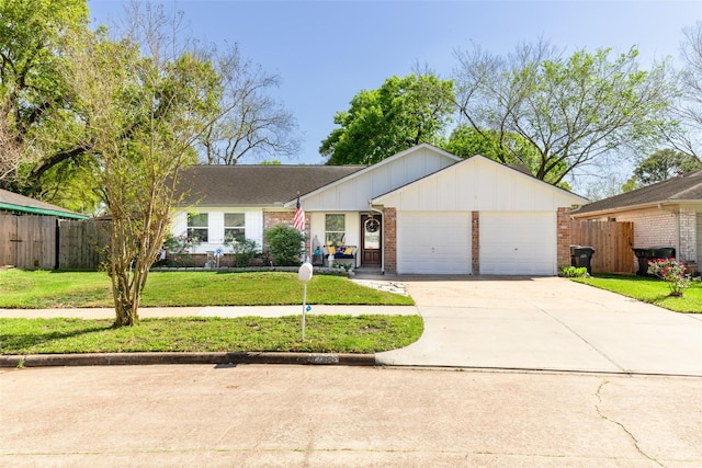 13755 Shirebrook Dr N, Sugar Land, TX 77498 - ranch-style home with an attached garage, brick siding, driveway, and board and batten siding