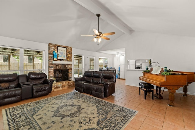 13755 Shirebrook Dr N, Sugar Land, TX 77498 - living area featuring a ceiling fan, light tile patterned floors, beam ceiling, a brick fireplace, and high vaulted ceiling