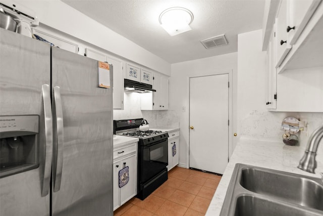13755 Shirebrook Dr N, Sugar Land, TX 77498 - kitchen featuring stainless steel fridge with ice dispenser, black range with gas cooktop, a sink, under cabinet range hood, and white cabinets