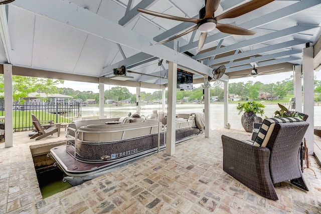 321 Marina Dr, Coldspring, TX 77331 - view of patio / terrace featuring a ceiling fan and a water view