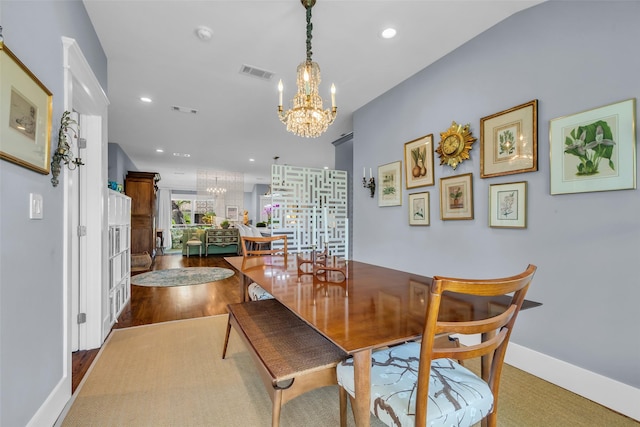 1819 Mill Creek Dr, Houston, TX 77008 - dining area featuring a chandelier, baseboards, and recessed lighting
