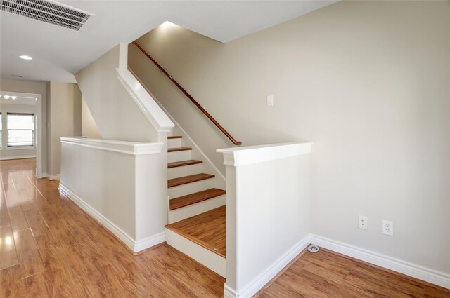 2617 Edgefield Lakes Dr, Houston, TX 77054 - stairs featuring wood finished floors, baseboards, and recessed lighting