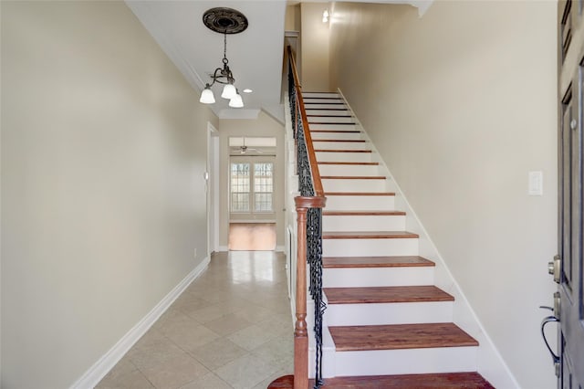 2617 Edgefield Lakes Dr, Houston, TX 77054 - stairs with crown molding, baseboards, tile patterned flooring, and ceiling fan