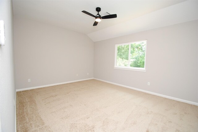 16611 Hope Farm Ln, Cypress, TX 77429 - empty room featuring carpet floors, vaulted ceiling, a ceiling fan, and baseboards