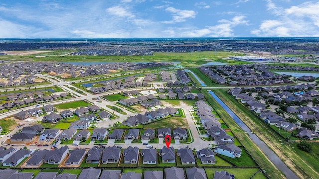 21111 Flowerhorn Dr, Cypress, TX 77433 - aerial view of property and surrounding area featuring nearby suburban area and a large body of water