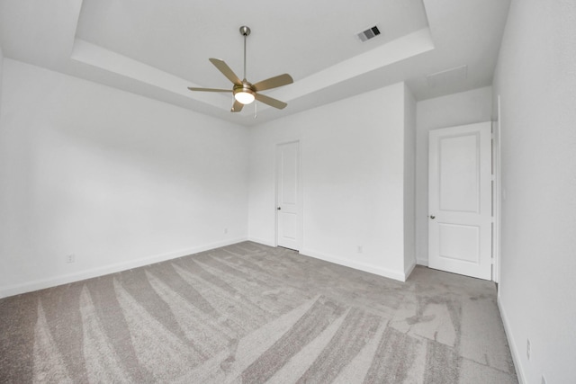 21111 Flowerhorn Dr, Cypress, TX 77433 - carpeted spare room featuring a raised ceiling, baseboards, and ceiling fan