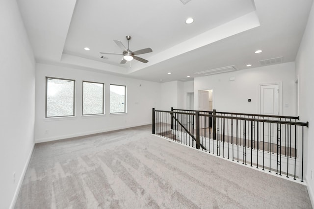 21111 Flowerhorn Dr, Cypress, TX 77433 - empty room featuring attic access, carpet floors, a raised ceiling, baseboards, and recessed lighting