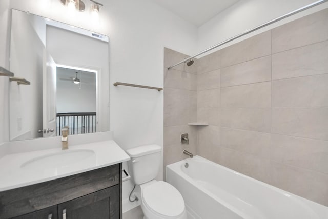 21111 Flowerhorn Dr, Cypress, TX 77433 - full bathroom featuring toilet, vanity,  shower combination, and ceiling fan