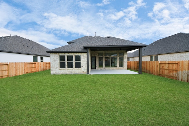 21111 Flowerhorn Dr, Cypress, TX 77433 - back of property with roof with shingles, a patio area, and brick siding