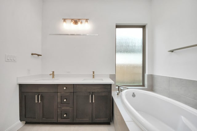 21111 Flowerhorn Dr, Cypress, TX 77433 - bathroom with a garden tub and double vanity