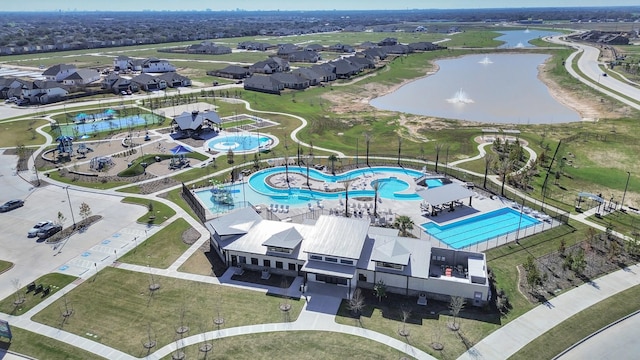 21114 Flowerhorn Dr, Cypress, TX 77433 - aerial perspective of suburban area featuring a nearby body of water and a pool area
