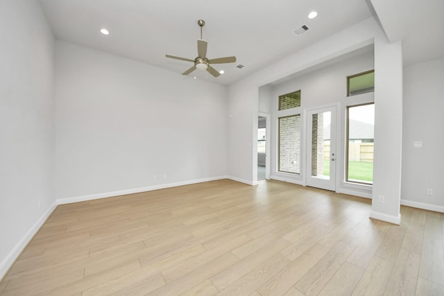 21114 Flowerhorn Dr, Cypress, TX 77433 - empty room featuring light wood-style flooring, a ceiling fan, baseboards, and recessed lighting
