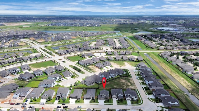 21114 Flowerhorn Dr, Cypress, TX 77433 - aerial view of property and surrounding area featuring nearby suburban area and a large body of water