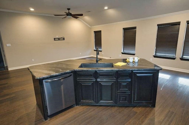 107 Brazos Ct, Richwood, TX 77531 - kitchen with stainless steel dishwasher, a sink, ceiling fan, baseboards, and a kitchen island with sink
