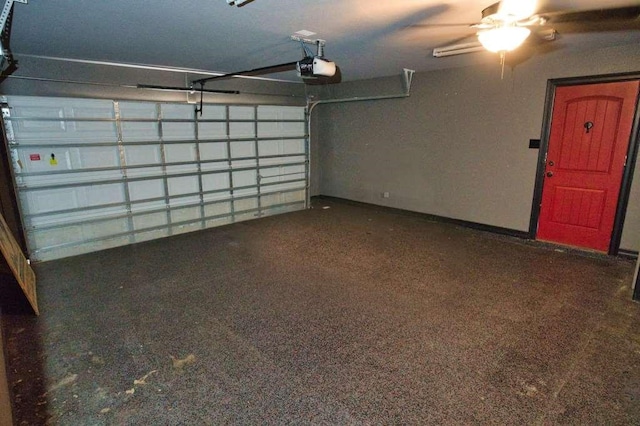 107 Brazos Ct, Richwood, TX 77531 - garage with ceiling fan and a garage door opener
