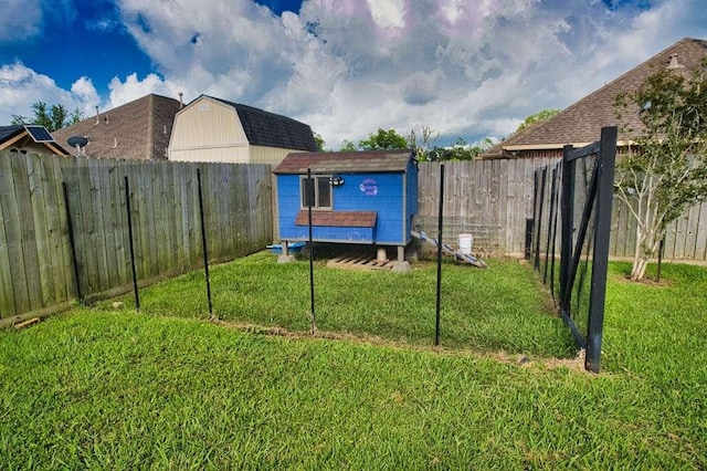 107 Brazos Ct, Richwood, TX 77531 - view of yard featuring exterior structure and an outbuilding