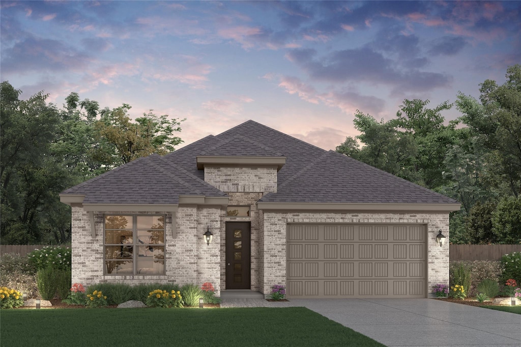 21122 Flowerhorn Dr, Cypress, TX 77433 - french country style house with a garage, concrete driveway, brick siding, and a shingled roof