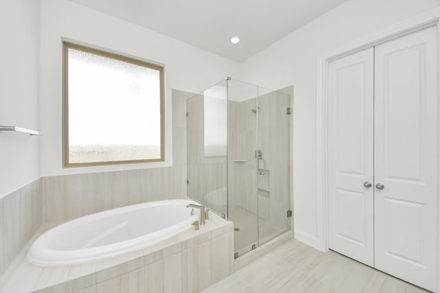 21122 Flowerhorn Dr, Cypress, TX 77433 - bathroom with a garden tub and a shower stall