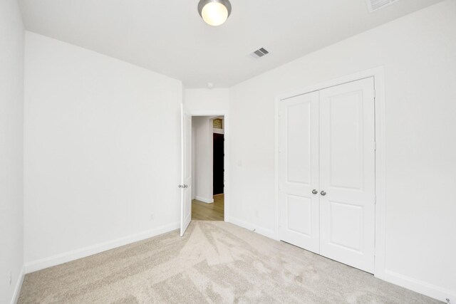 21122 Flowerhorn Dr, Cypress, TX 77433 - unfurnished bedroom featuring carpet floors, a closet, and baseboards