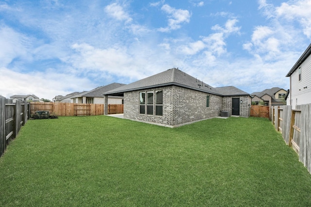 21122 Flowerhorn Dr, Cypress, TX 77433 - rear view of house featuring brick siding and central air condition unit