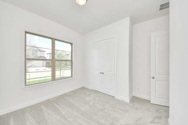 21122 Flowerhorn Dr, Cypress, TX 77433 - unfurnished bedroom featuring carpet flooring, baseboards, and a closet