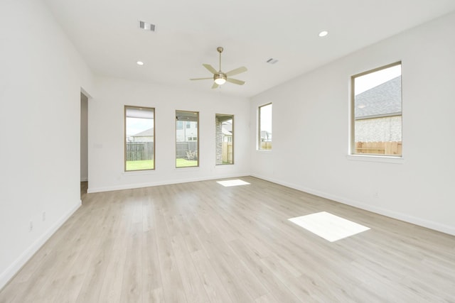 21122 Flowerhorn Dr, Cypress, TX 77433 - empty room with a ceiling fan, light wood finished floors, baseboards, and recessed lighting