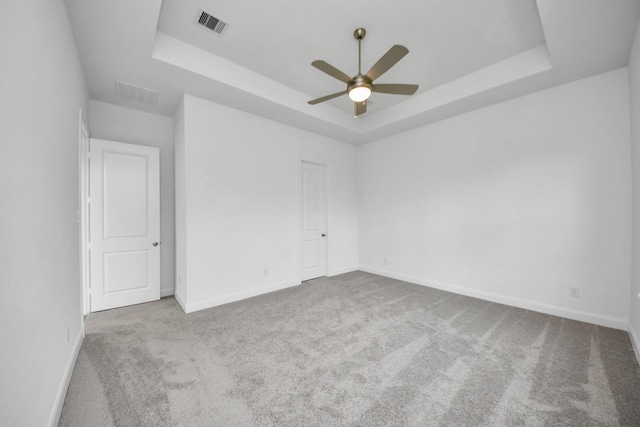 21114 Regal Terrace Dr, Cypress, TX 77433 - carpeted spare room with a raised ceiling, a ceiling fan, and baseboards