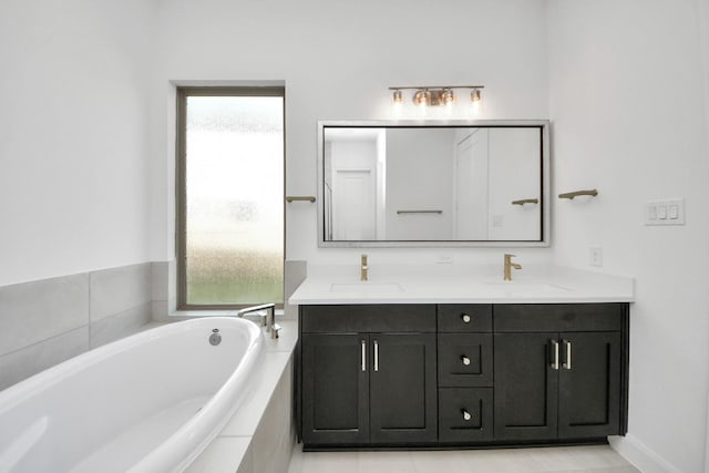21114 Regal Terrace Dr, Cypress, TX 77433 - bathroom with healthy amount of natural light, double vanity, and a bath