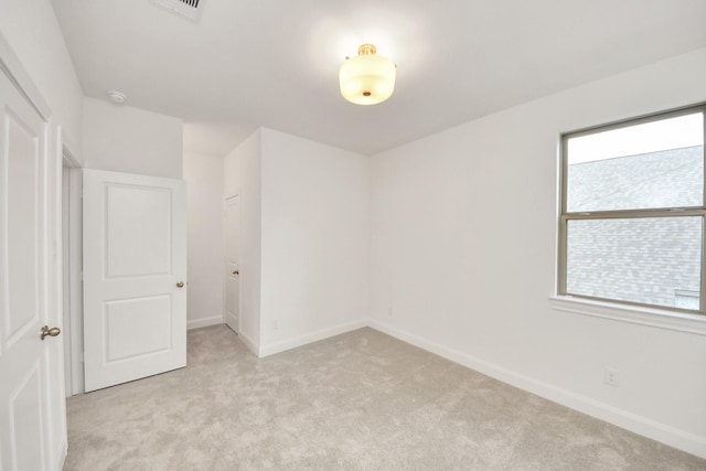 21130 Flowerhorn Dr, Cypress, TX 77433 - spare room featuring light carpet, baseboards, and a smoke detector