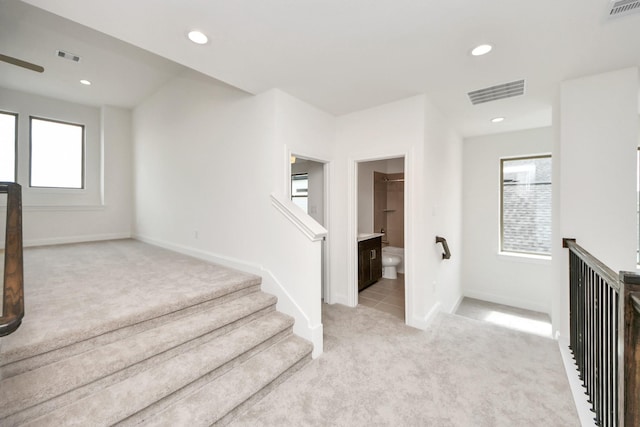 21130 Flowerhorn Dr, Cypress, TX 77433 - staircase with carpet flooring, plenty of natural light, baseboards, and recessed lighting