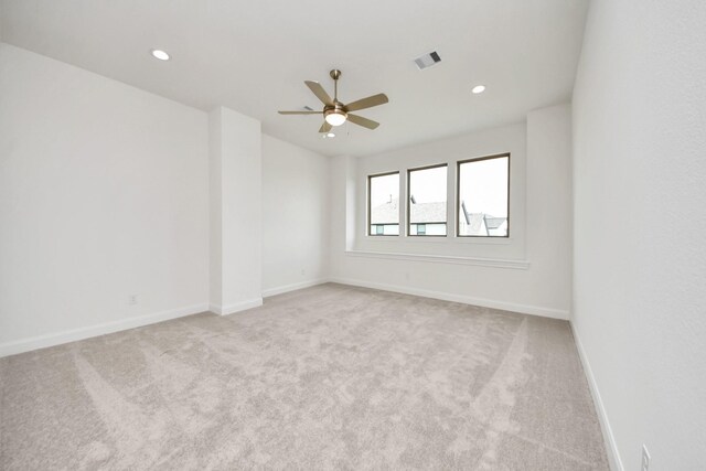 21130 Flowerhorn Dr, Cypress, TX 77433 - unfurnished room with light carpet, a ceiling fan, baseboards, and recessed lighting