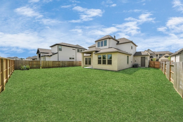 21130 Flowerhorn Dr, Cypress, TX 77433 - rear view of property with a shingled roof, central air condition unit, and a residential view