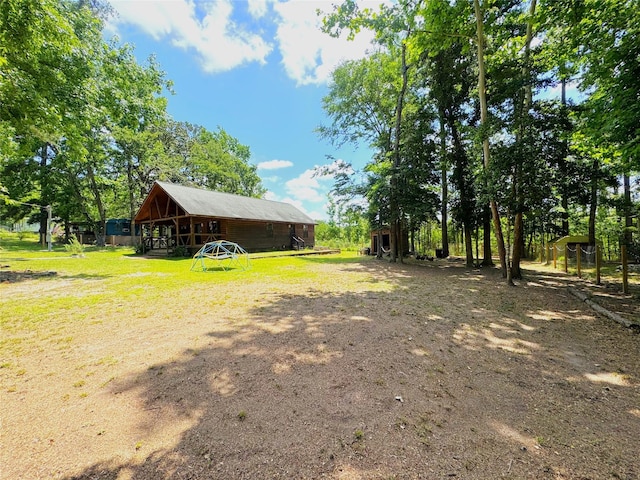 798 Port Blvd, Trinity, TX 75862 - view of yard with an outbuilding