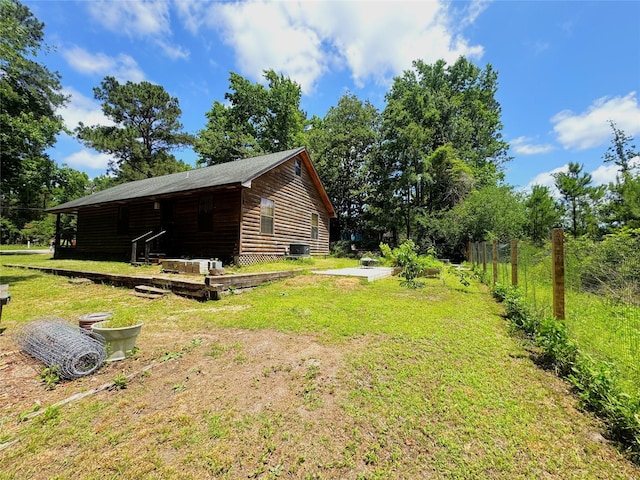 798 Port Blvd, Trinity, TX 75862 - view of home's exterior featuring a yard