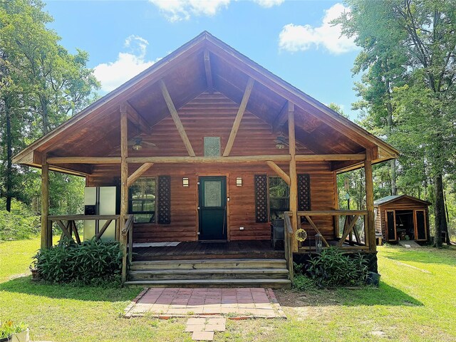 798 Port Blvd, Trinity, TX 75862 - view of front facade with a front yard and a porch