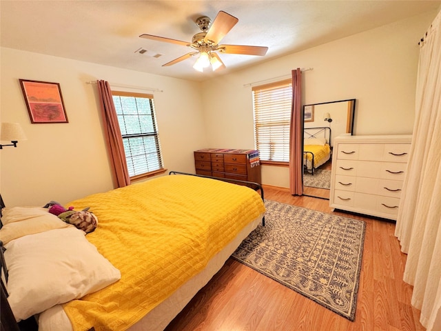 798 Port Blvd, Trinity, TX 75862 - bedroom with light wood-type flooring and ceiling fan