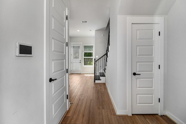 1930 Pueblo Nuevo Path, Houston, TX 77077 - corridor featuring baseboards, wood finished floors, and stairs