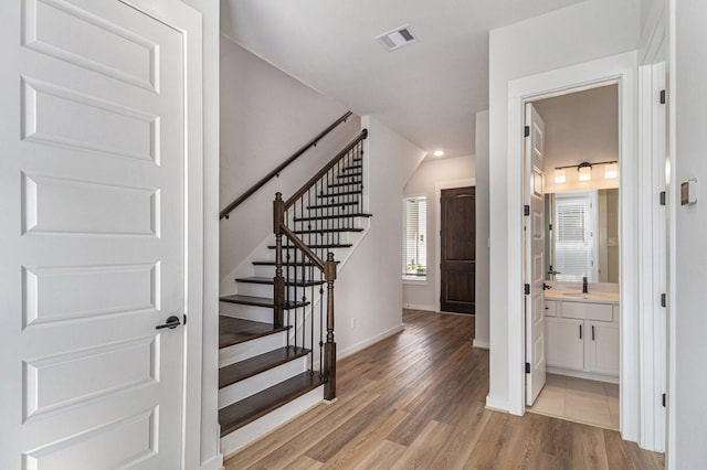 1930 Pueblo Nuevo Path, Houston, TX 77077 - stairs with wood finished floors and baseboards