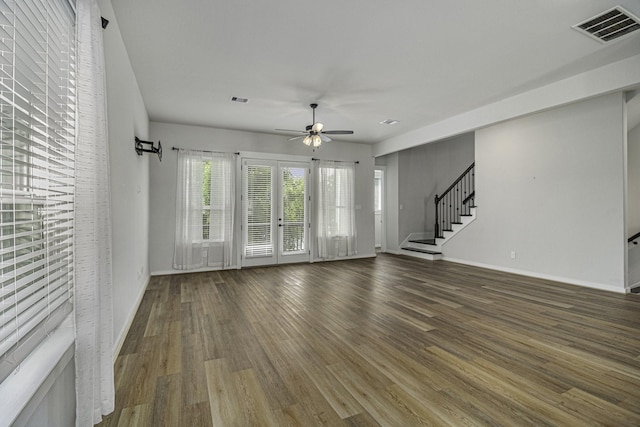 1930 Pueblo Nuevo Path, Houston, TX 77077 - unfurnished living room featuring ceiling fan, wood finished floors, stairway, and baseboards