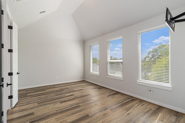 1930 Pueblo Nuevo Path, Houston, TX 77077 - spare room with lofted ceiling, wood finished floors, and baseboards