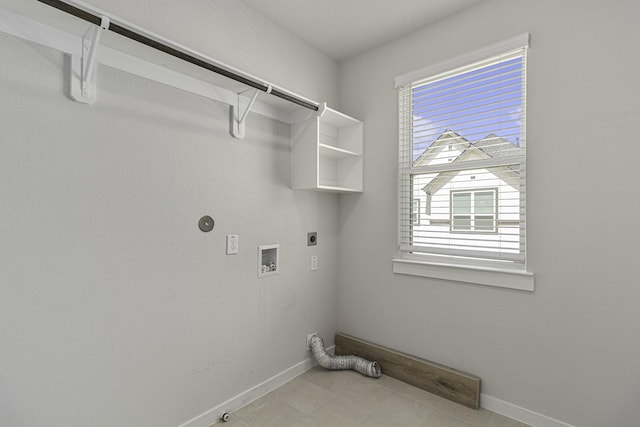 1930 Pueblo Nuevo Path, Houston, TX 77077 - laundry area with electric dryer hookup, gas dryer hookup, baseboards, washer hookup, and light tile patterned floors