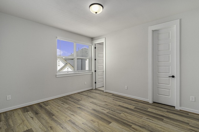1930 Pueblo Nuevo Path, Houston, TX 77077 - unfurnished bedroom with wood finished floors and baseboards