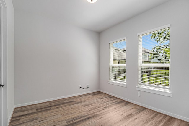 1930 Pueblo Nuevo Path, Houston, TX 77077 - empty room with wood finished floors and baseboards