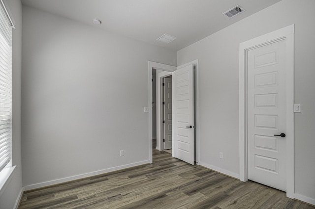 1930 Pueblo Nuevo Path, Houston, TX 77077 - unfurnished bedroom with wood finished floors and baseboards