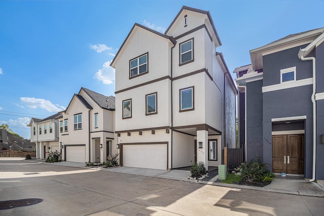 1930 Pueblo Nuevo Path, Houston, TX 77077 - view of front of property featuring stucco siding, an attached garage, and concrete driveway