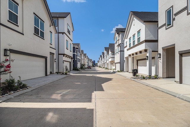 1930 Pueblo Nuevo Path, Houston, TX 77077 - view of concrete road featuring a residential view