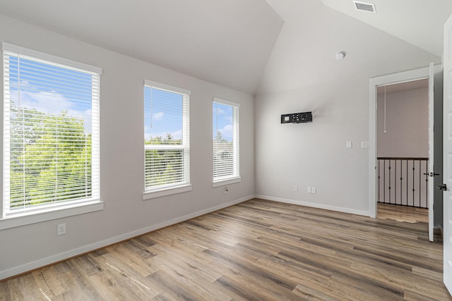 1930 Pueblo Nuevo Path, Houston, TX 77077 - spare room featuring lofted ceiling, wood finished floors, and baseboards